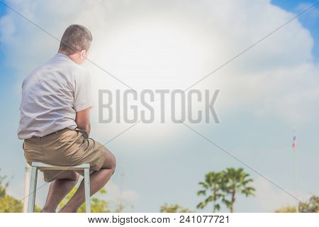 Student Acting Like A Superhero On Top Of Stepladder In School.