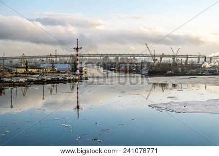 Saint-petersburg.russia.6 April 2018. Cranes  And Ships In The Marine Cargo Port Of Saint-petersburg