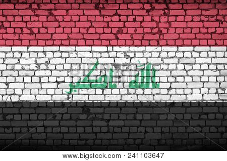 Iraq Flag Is Painted Onto An Old Brick Wall