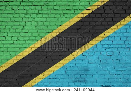 Tanzania Flag Is Painted Onto An Old Brick Wall