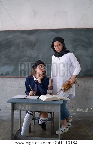 Teacher Teaching Student