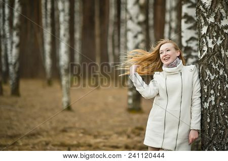 The Girl Has Leant Against A Birch.