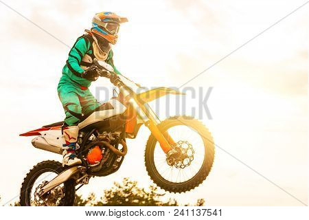 Dirt Bike Rider Is Flying High In Evening