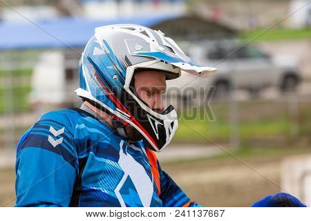 Close Up View Biker's Face In Helmet. Closeup Portrait Of A Man In Motorcycle Helmet