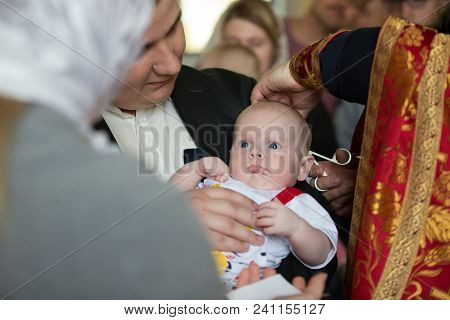 Belarus, Gomel, May 6, 2018. Church Of Volotovo. Baptism Of A Newborn Child.the Baptism Of A Child.h