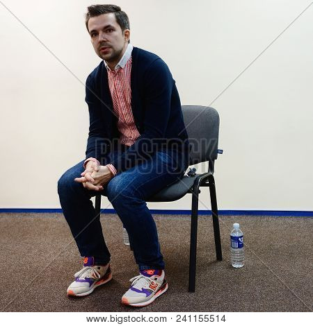 Vilnius, Lithuania - May 4, 2016: Belorussian Novelist And Journalist Sasha Filipenko Sitting In The