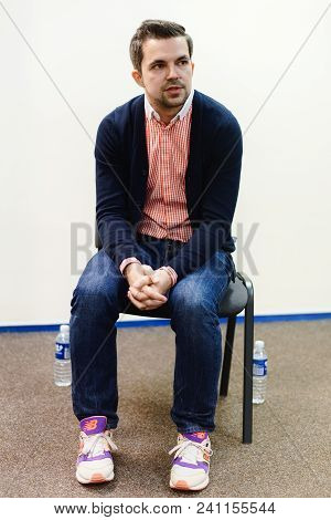 Vilnius, Lithuania - May 4, 2016: Belorussian Novelist And Journalist Sasha Filipenko Sitting On The