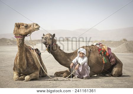 Ibri, Oman, 28th April 2018: Omani Men At A Traditional Horse Race Event Where Young Riders Show The