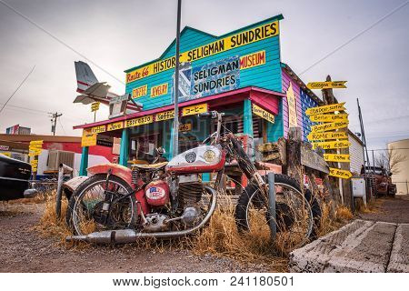 Seligman, Arizona, Usa - January 2, 2018 : Vintage Motorbike Left Abandoned In Front Of A Souvenir S