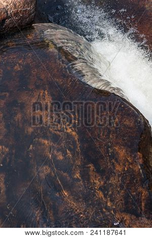 Close Up Water Fluent. With Stone. Angola. Lubango.