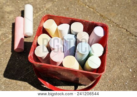 Colorful Chalk On A Playground In Summer