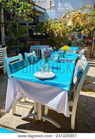 A Nice Table Near The Sea With Flowers At Simena Ucagiz , Kas, Turkey