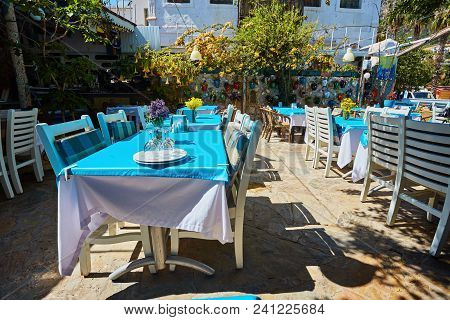 A Nice Table Near The Sea With Flowers At Simena Ucagiz , Kas, Turkey