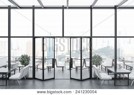 Side View Of A Glass Roof Restaurant With A Concerete Floor And Tables With White Sofas Near Them. 3