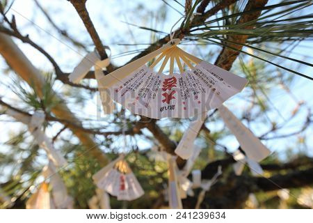 Kyoto Japan - May 04, 2018: Omikuji Hanged On Trees At Chionji Temple Kyoto Japan. Omikuji Is Random
