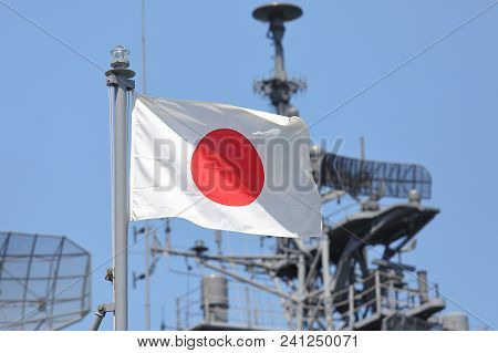 Japanese Self Defence Force Navy War Ship And Japanese National Flag