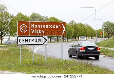 Visby, Sweden - May 15, 2016: Signpost At The Farjeleden Road With Direction To World Heritage Site 
