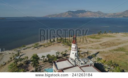 Coastline With Beach And Lighthouse, Mountains. Aerial View: Coast Sea With Hotels, Resorts, Subic B