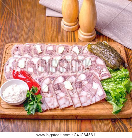 Sliced Meatloaf From Pork With Vegetables. Saltison