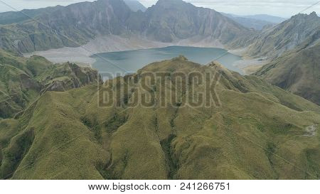 Crater Lake Of The Volcano Pinatubo Among The Mountains, Philippines, Luzon. Aerial View Beautiful L