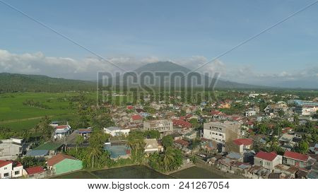 Aerial View Of Town In A Mountain Valley At The Foot Of The Mountain Iriga. Luzon, Philippines. Moun
