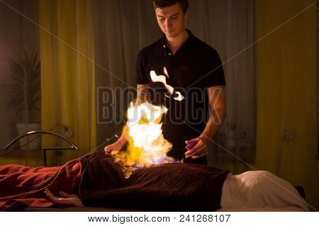 Chinese Fire Massage - Huo Liao Therapy. Traditional Chinese Medicine, Fire Treatment And Bodycare C