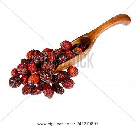 Berries Dried Rosehips In The Wooden Spoon, Isolated On White Background.