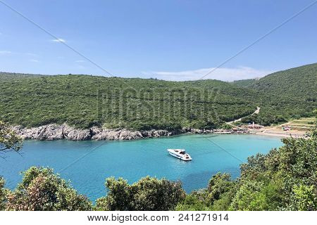 Aerial View Of The Coast Of Montenegro.  Turquoise Sea Water On The Ploce Beach.