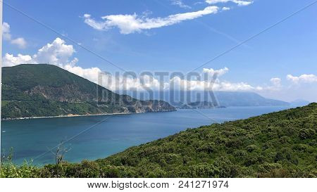 Aerial View Of The Coast Of Montenegro.  Turquoise Sea Water On The Ploce Beach.