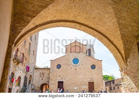 San Giminiano, Italy - May 26, 2016: Tourists On The Steps Of The Cathedral