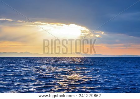 Sunset Rays Shining Through The Clouds Adriatic Sea Montenegro, Europe.