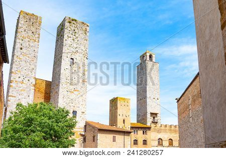 San Giminiano, Italy, The Famous Medieval Towers Of The Old Town, Seen From Delle Erbe Square