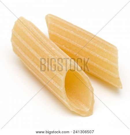 Italian pasta isolated on white background. Pennoni. Penne rigate.