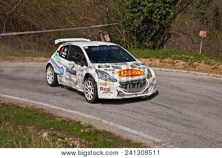 Cesena, Italy - April 8, 2018: Driver And Co-driver On Racing Car Peugeot 208 T16 Running In 12th Ra