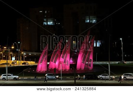 Ashdod - Israel, May 14, 2018: Circular Crossroads With Stylized Sails And Night Lights In Ashdod