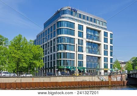 Berlin, Germany - April 22, 2018: River Spree And Its Bank Schiffbauerdamm, Modern Representative Bu