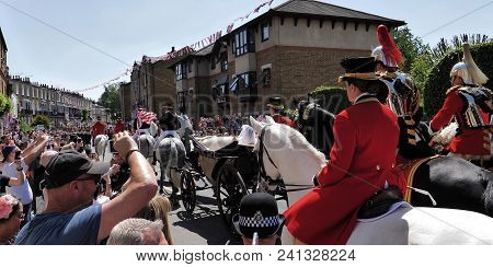 Windsor, England - May 19 2018: Prince Harry, Duke Of Sussex And Meghan, Duchess Of Sussex Leave Win