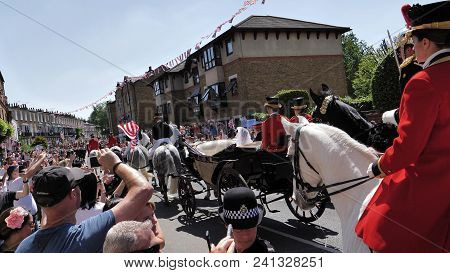 Windsor, England - May 19 2018: Prince Harry, Duke Of Sussex And Meghan, Duchess Of Sussex Leave Win
