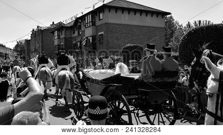 Windsor, England - May 19 2018: Prince Harry, Duke Of Sussex And Meghan, Duchess Of Sussex Leave Win