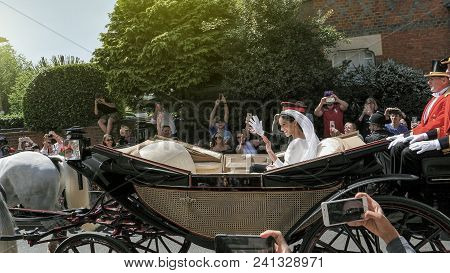 Windsor, England - May 19 2018: Sunlight Flare Over Prince Harry, Duke Of Sussex And Meghan Markle, 