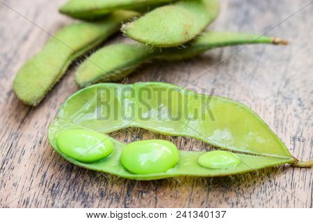 Opened Boiled Green Edamame Or Soy Bean On Wood