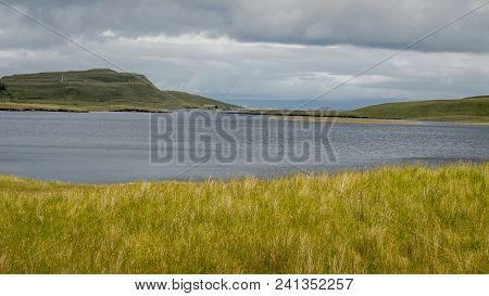 Loch Leathan At The Isle Of Skye With A Dramatic Cloudly Sky In Background, Scotland, Uk