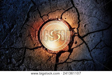 Shiny Golden Syscoin Cryptocurrency Coin On Dry Earth Dessert Background Mining Crash Photo Composit