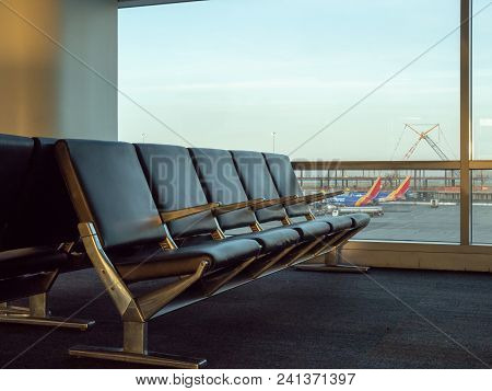 San Francisco, Ca - May 10, 2018: Empty Seats At Sfo Airport With Southwest Planes In Background