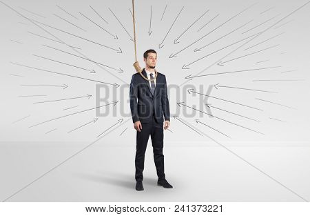 Hopeless young businessman trying to suicide with question signs concept