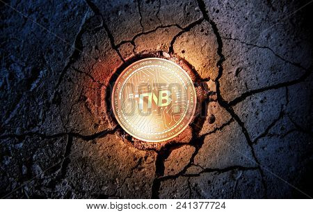 Shiny Golden Tnb Cryptocurrency Coin On Dry Earth Dessert Background Mining Crash Photo Composition