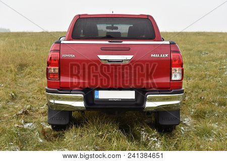 Slany, Czech Republic - November 10, 2016: Red Toyota Hilux In Slany, Czech Republic, November 10, 2