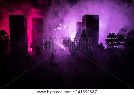 Empty Street Of Burnt Up City, Flames On The Ground And Blasts With Smoke In The Distance. Apocalypt