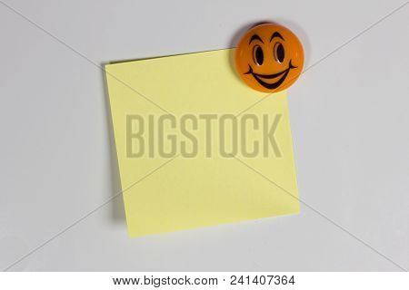 Yellow Empty Sticker On The Fridge With A Cheerful Smile