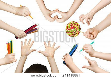 Set Of Child Hands Holding Items. Lollipop, Pencils And Showing Heart, Symbols In Various Hadns. Iso